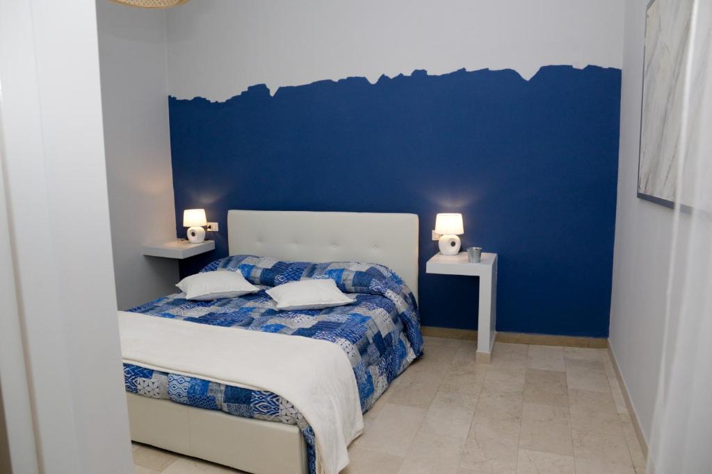 Postel nebo postele na pokoji v ubytování Ad Astra Rooms