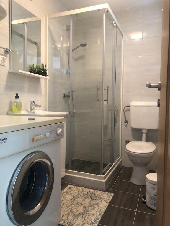 Koupelna v ubytování Apartments Uno