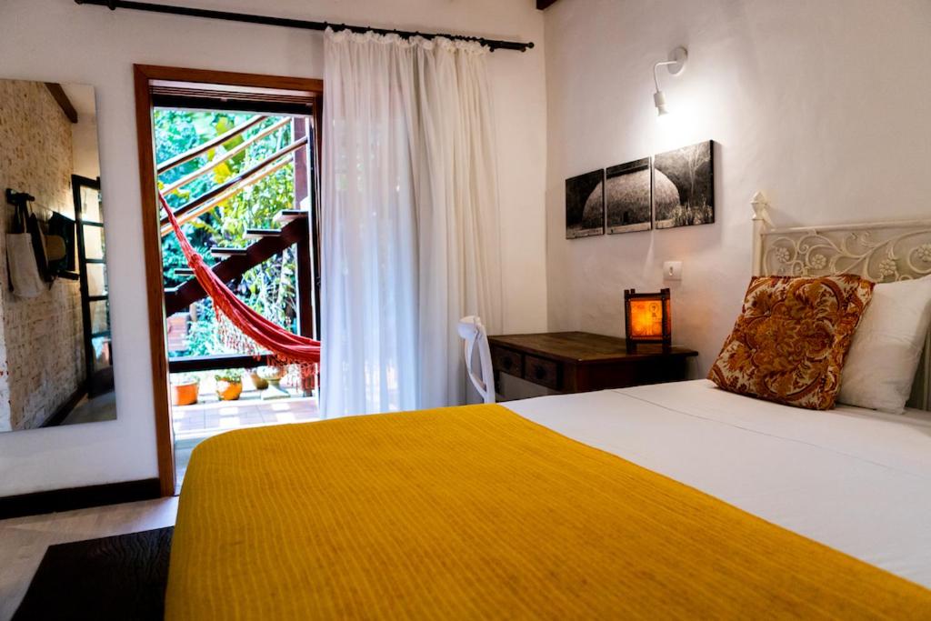 Postel nebo postele na pokoji v ubytování Casa Ka