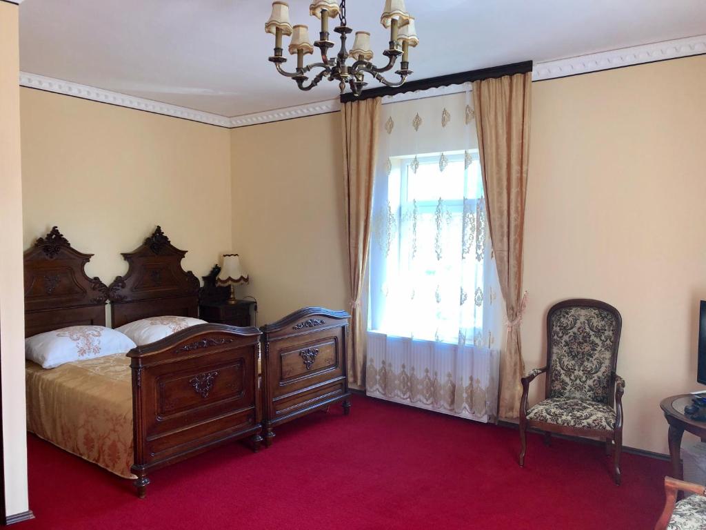 Ein Bett oder Betten in einem Zimmer der Unterkunft Lambach Villa