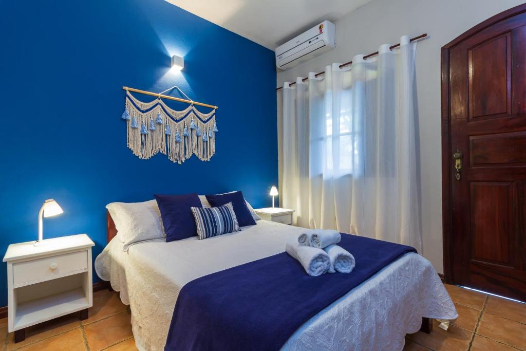Postel nebo postele na pokoji v ubytování Estrela do Mar Paraty