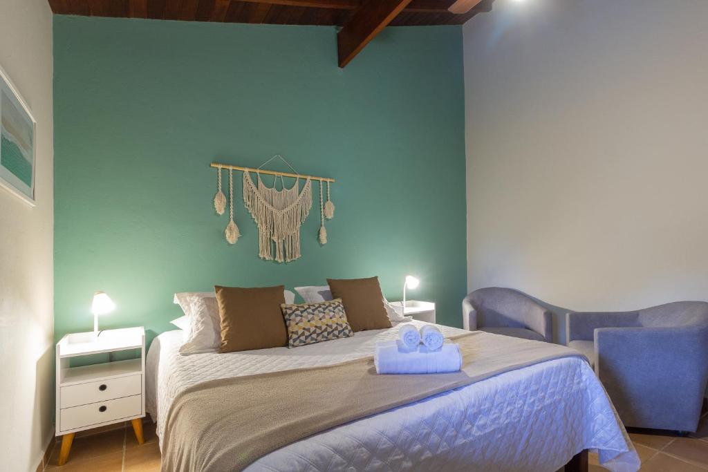 Postel nebo postele na pokoji v ubytování Estrela do Mar Paraty
