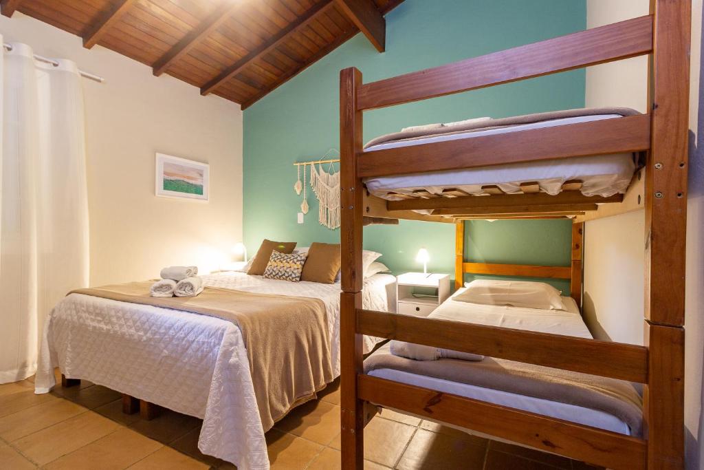 Postel nebo postele na pokoji v ubytování Estrela do Mar Paraty