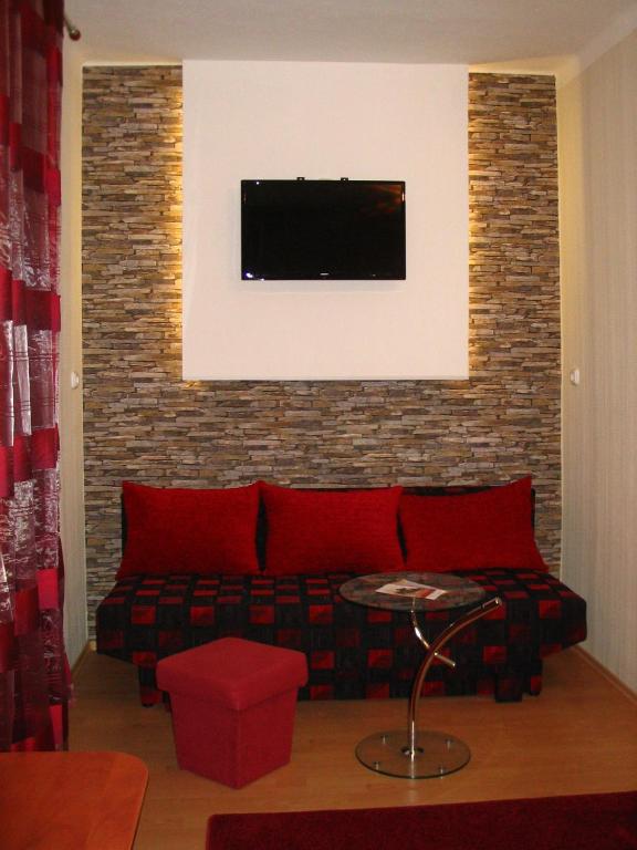 TV a/nebo společenská místnost v ubytování Fortuna Hotel