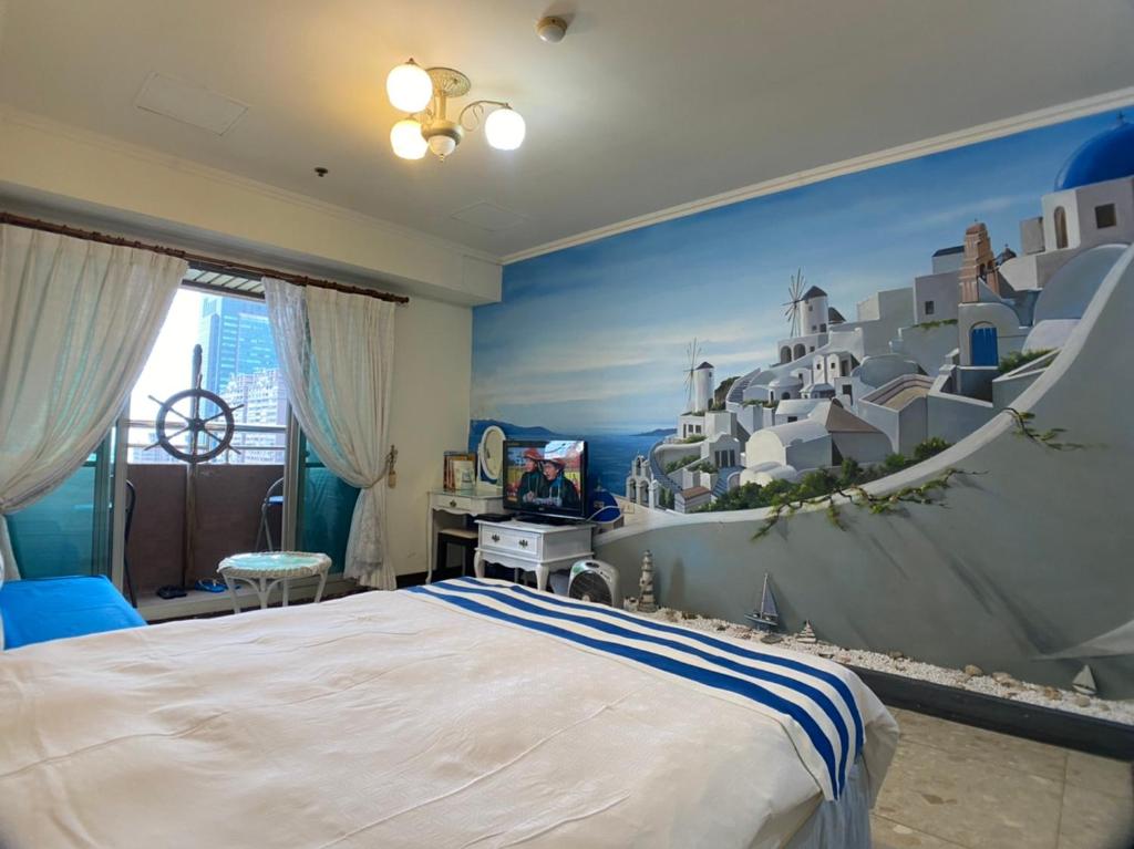 a bedroom with a large bed with a wall mural at CT Theme Suite in Kaohsiung