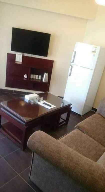 TV a/nebo společenská místnost v ubytování Porto Sauth Beach Chalets Family,s only AN