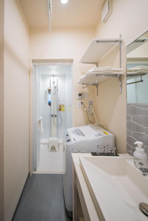 Postel nebo postele na pokoji v ubytování Hotel Celeste Shizuoka