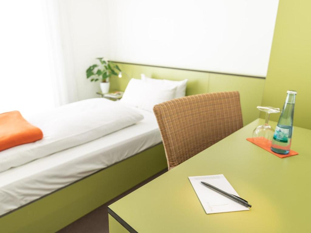 Postel nebo postele na pokoji v ubytování viavelo hotel