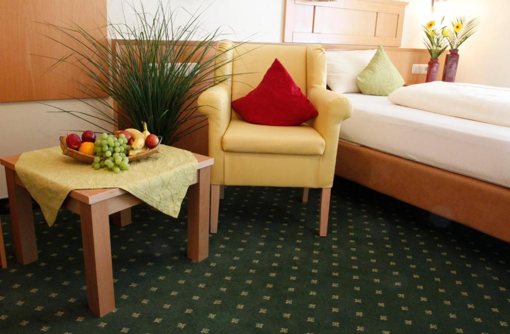 Postel nebo postele na pokoji v ubytování Apart-Hotel Pension Roßmayer