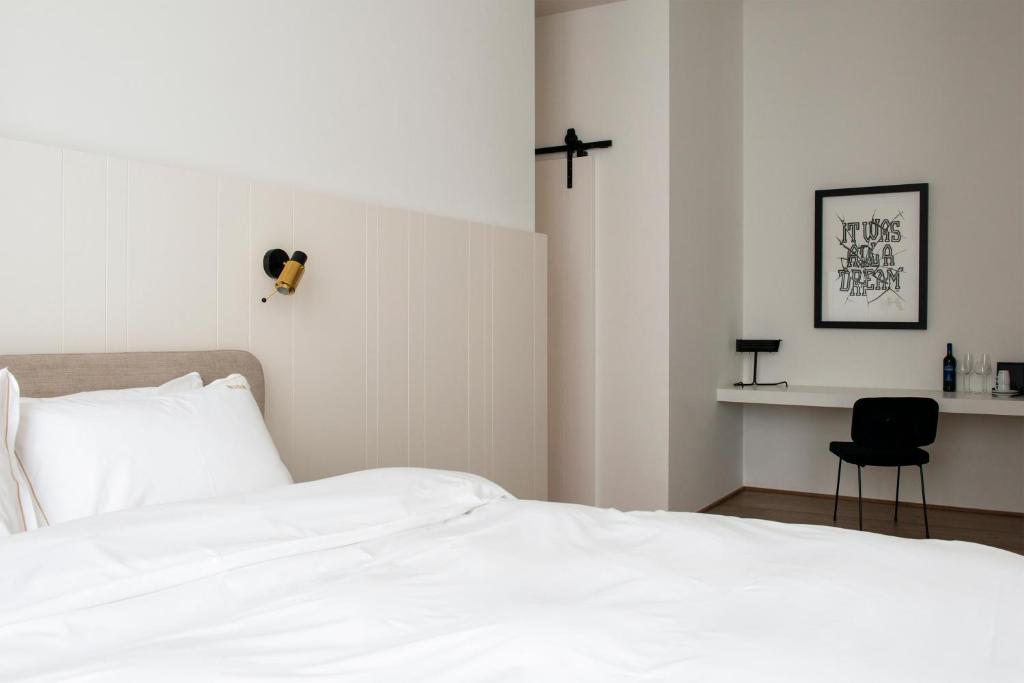 Postel nebo postele na pokoji v ubytování Hotel Riga