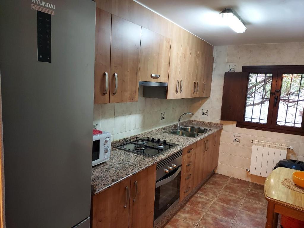 Kuchyňa alebo kuchynka v ubytovaní Casa del Águila Dorada