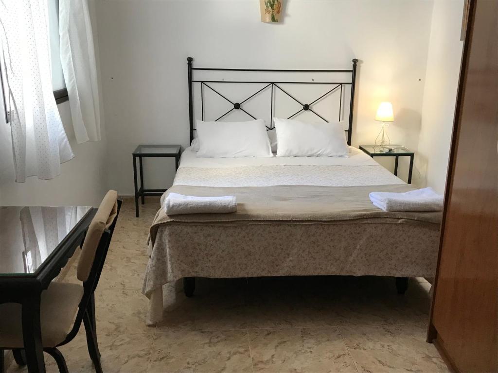 Cama o camas de una habitación en Pension el Portillo