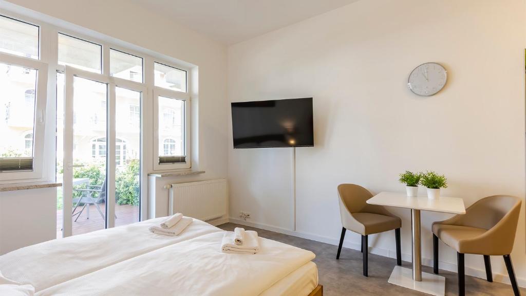 TV a/nebo společenská místnost v ubytování VacationClub - Trzy Korony Jagiellonów Apartament 9