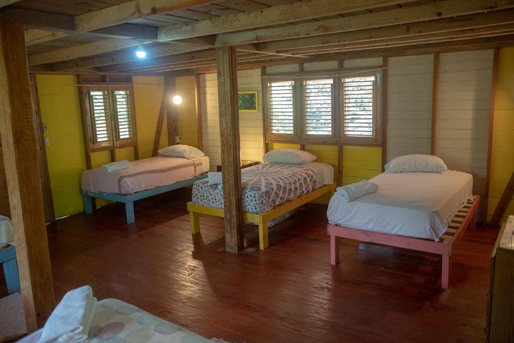 Postel nebo postele na pokoji v ubytování Aventura Rincon Ecolodge