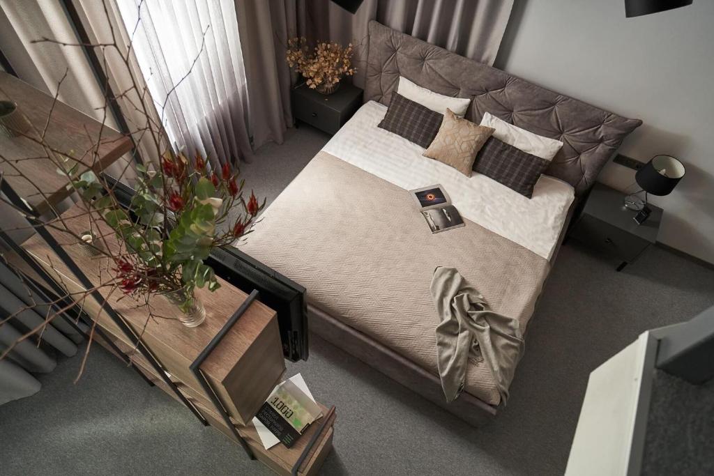 Postel nebo postele na pokoji v ubytování Deribas Hotel