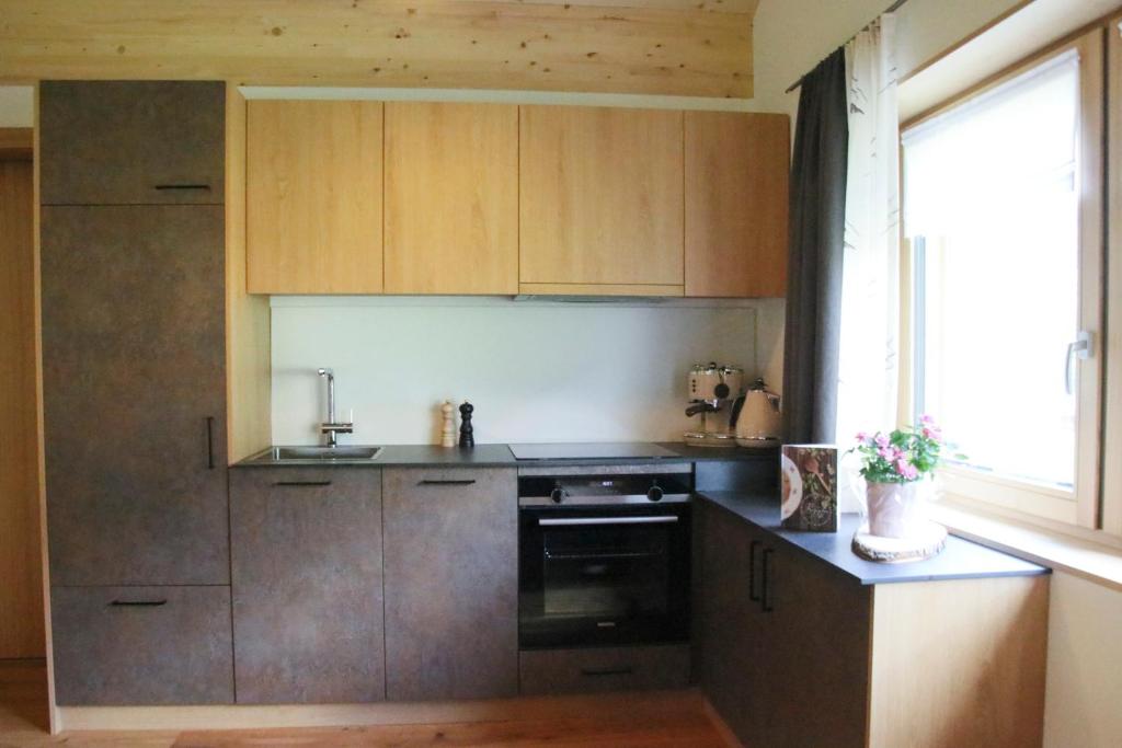 Kuchyň nebo kuchyňský kout v ubytování Haus Bergquell