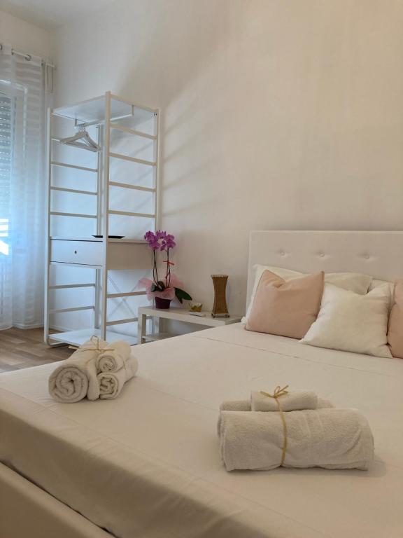 Postel nebo postele na pokoji v ubytování Meraki B&B