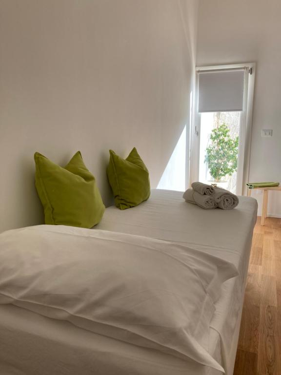 Postel nebo postele na pokoji v ubytování Meraki B&B