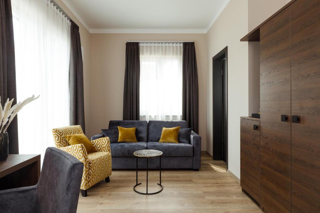 Posezení v ubytování Herzl Hotel bei Erding