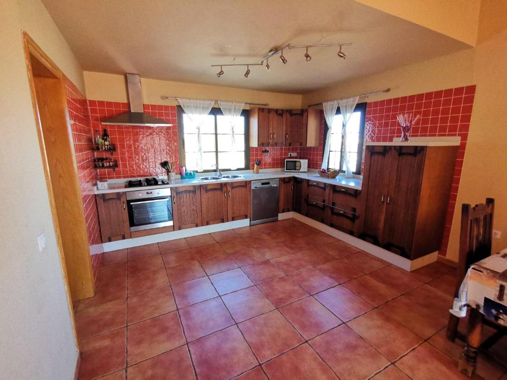 Kuchyň nebo kuchyňský kout v ubytování Magic house