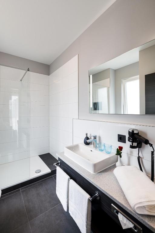 Koupelna v ubytování Herzl Hotel bei Erding