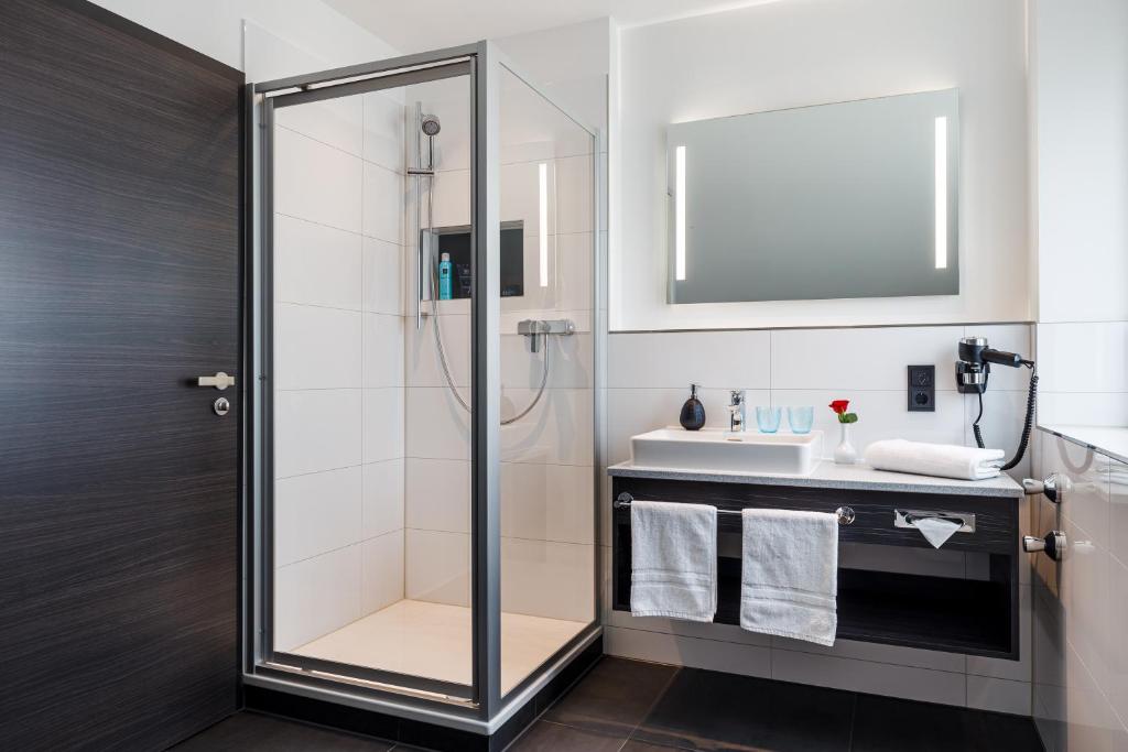 Koupelna v ubytování Herzl Hotel bei Erding