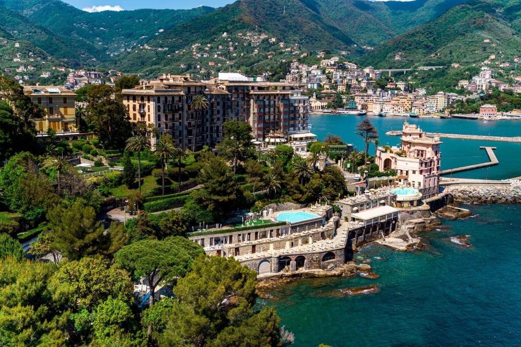 an aerial view of a town on the water at Excelsior Palace Hotel in Rapallo