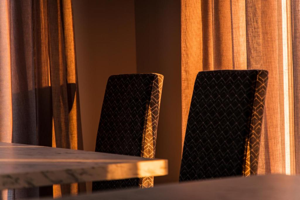 Posezení v ubytování Herzl Hotel bei Erding