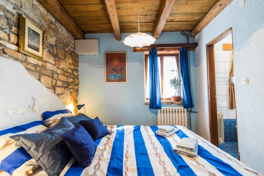 Postel nebo postele na pokoji v ubytování Rural Pension Istra Partner