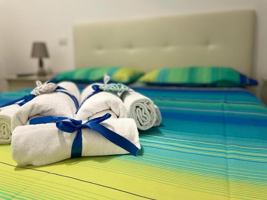 Postel nebo postele na pokoji v ubytování B&B Le Colombine