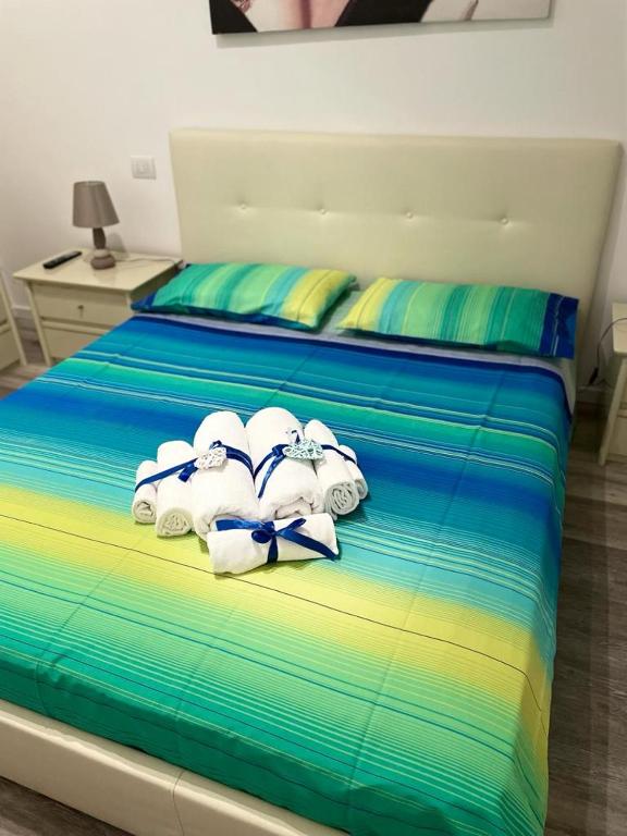 Postel nebo postele na pokoji v ubytování B&B Le Colombine