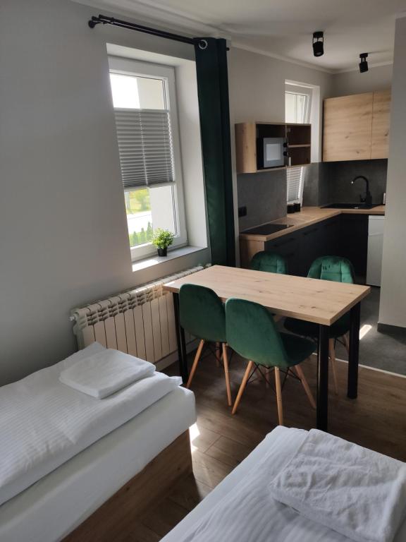 Posteľ alebo postele v izbe v ubytovaní Krollhouse Pokoje gościnne