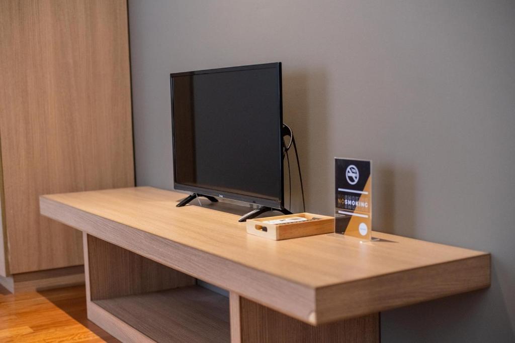 TV a/nebo společenská místnost v ubytování Three J Residence 2