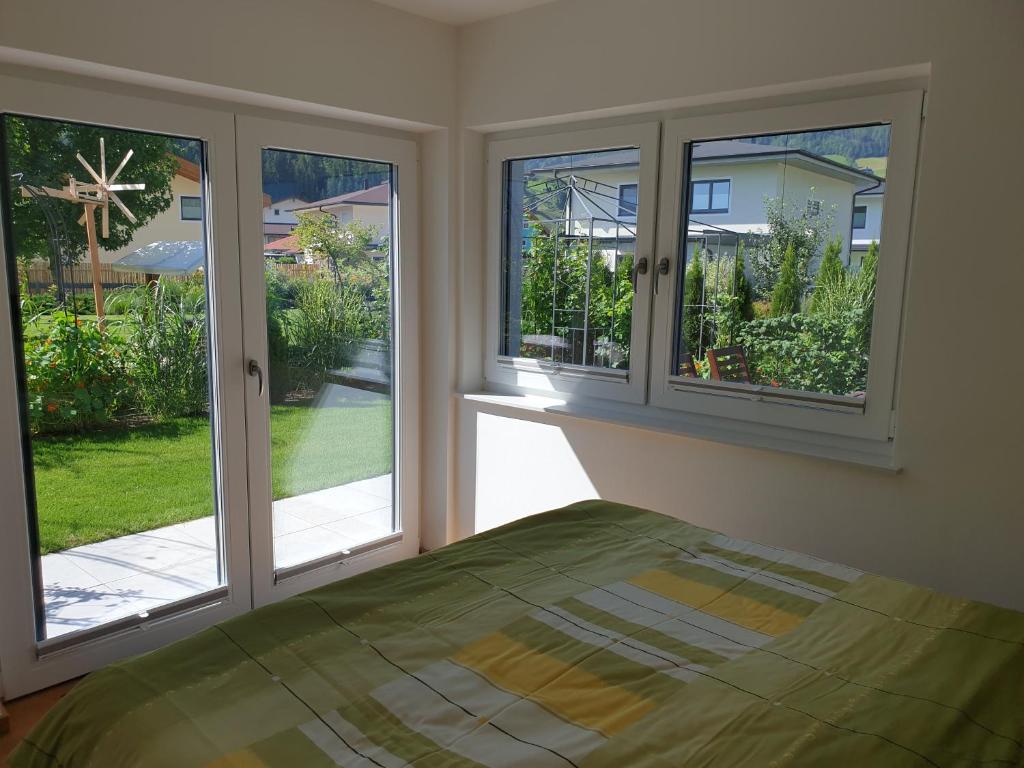 Posteľ alebo postele v izbe v ubytovaní Golf & Ski Appartements Mittersill Trausmuth Monika inkl Sommercard - Golfplatz 500 m entfernt, inkl Waschmaschine, Trockner