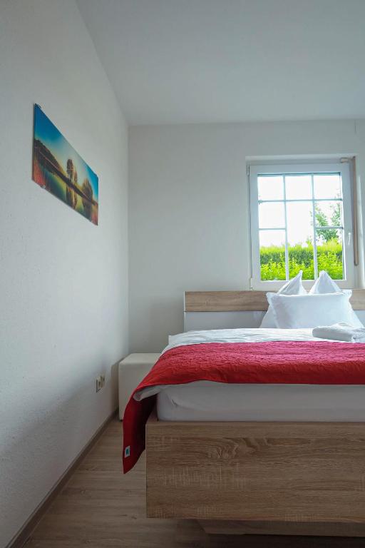 Postel nebo postele na pokoji v ubytování Pannonia Lake House