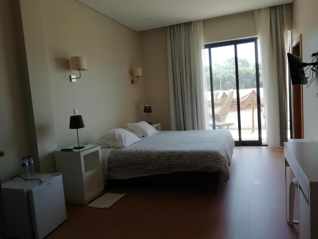Cama ou camas em um quarto em Green & Sea Comporta Retreat