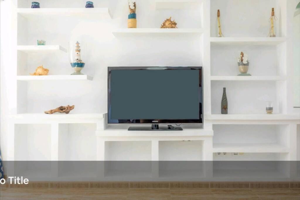 TV a/nebo společenská místnost v ubytování Syrenah Apartment in Can Picafort