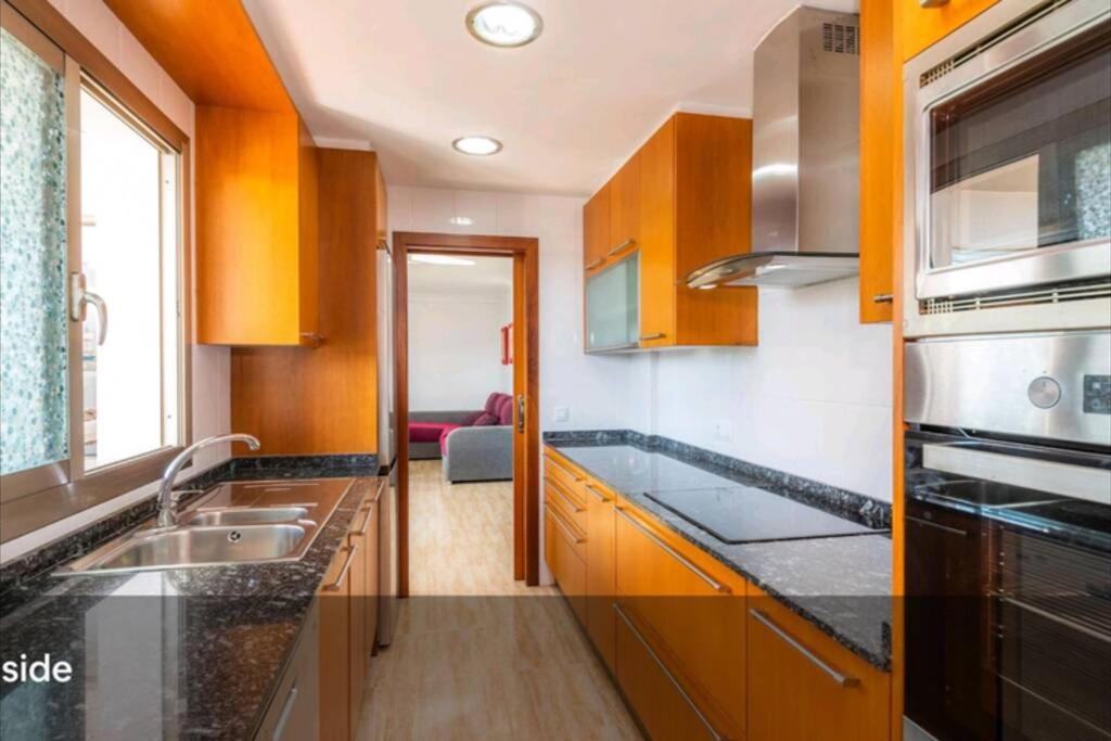 Kuchyň nebo kuchyňský kout v ubytování Syrenah Apartment in Can Picafort