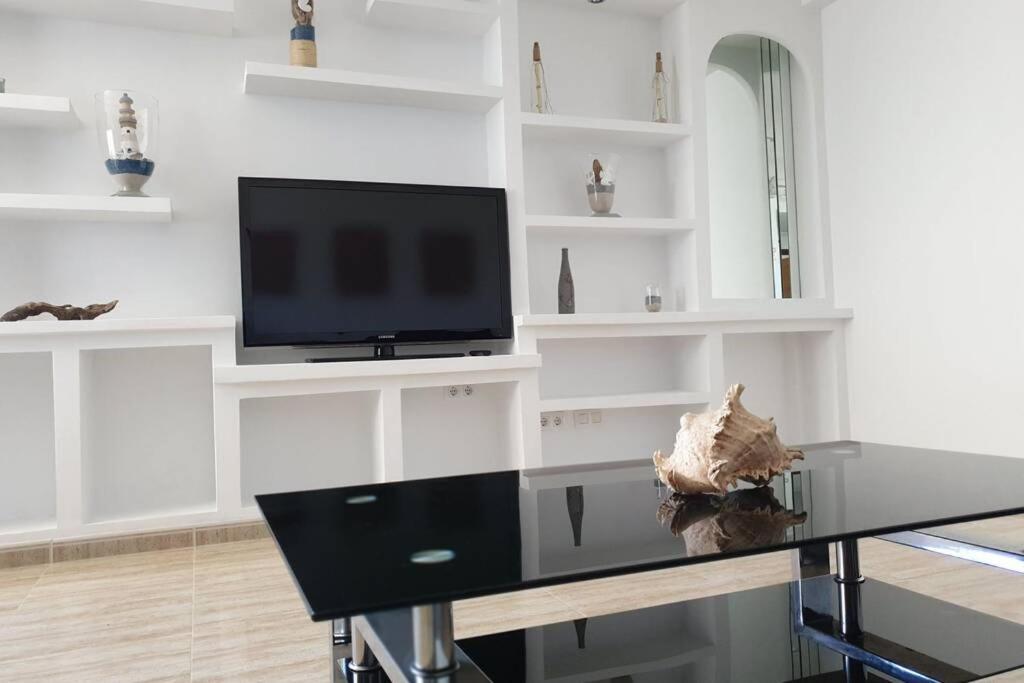 TV a/nebo společenská místnost v ubytování Syrenah Apartment in Can Picafort
