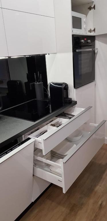 Kuchyňa alebo kuchynka v ubytovaní Apartament Premium