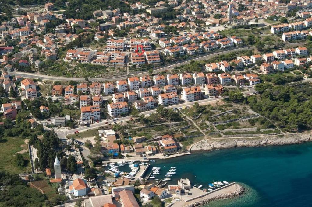 an aerial view of a town next to the water at Apartment Goga in Mali Lošinj