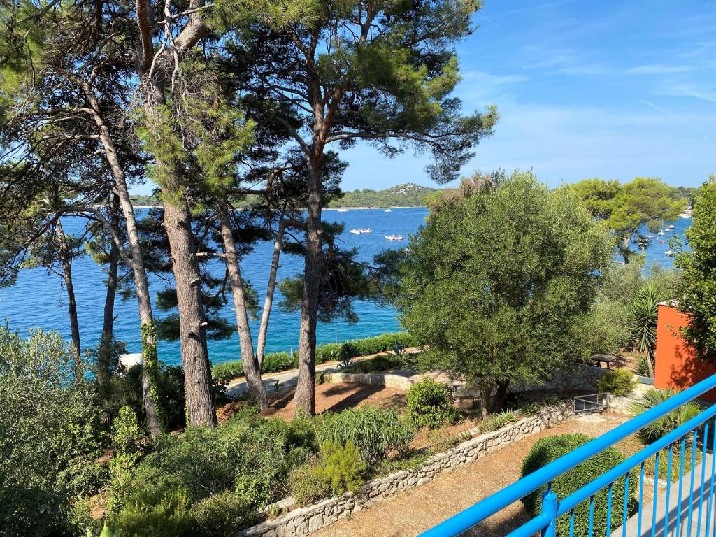 a view of the water from the balcony of a house at Casita Liliana By the Sea in Mali Lošinj