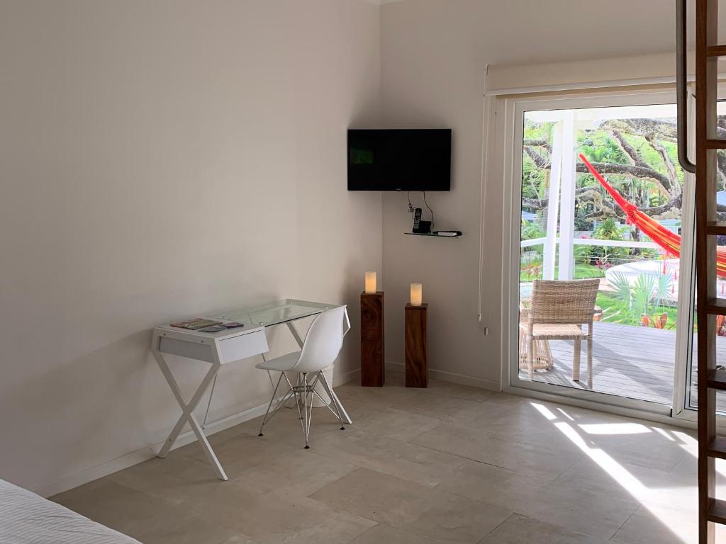 TV a/nebo společenská místnost v ubytování Aves Hotel Montezuma