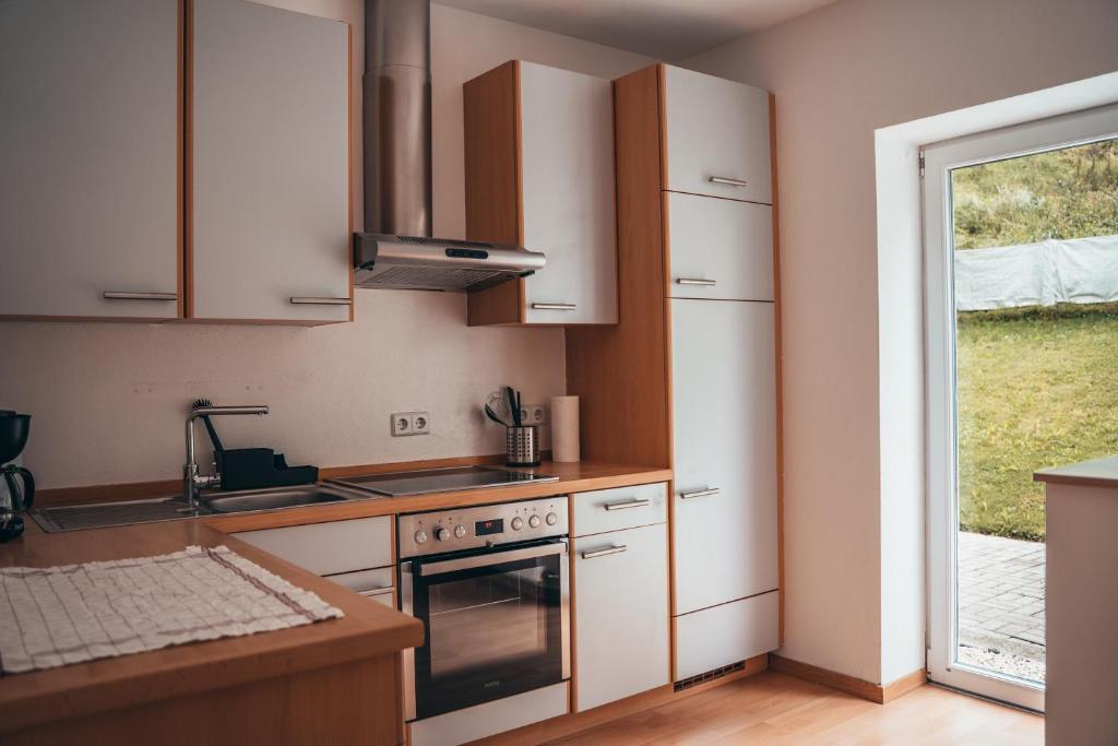 Kuchyň nebo kuchyňský kout v ubytování Residenz Tulferhof