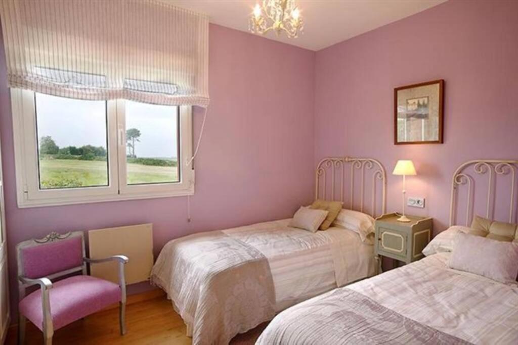 Postel nebo postele na pokoji v ubytování Villa Brandán - Villa con piscina privada para 12p - VV-187-AS Y VV-188-AS