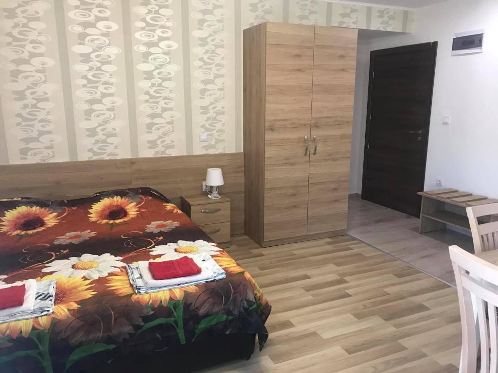 Postel nebo postele na pokoji v ubytování GUEST HOUSE ZORNICA in OBZOR