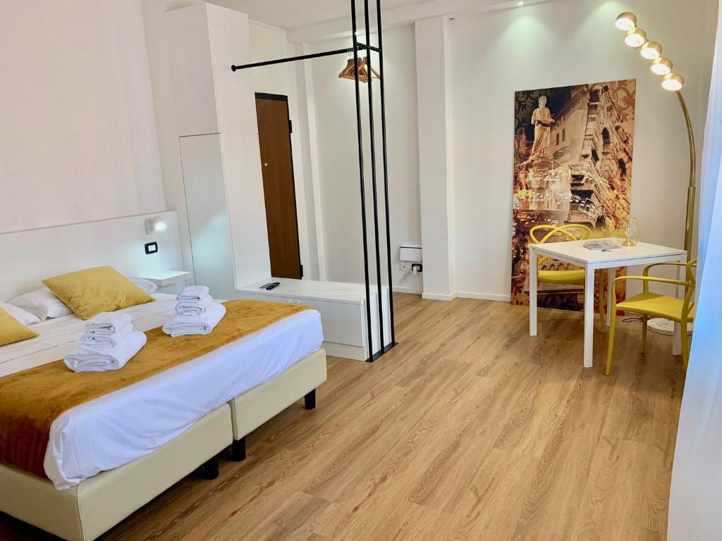 Postel nebo postele na pokoji v ubytování Truly Verona