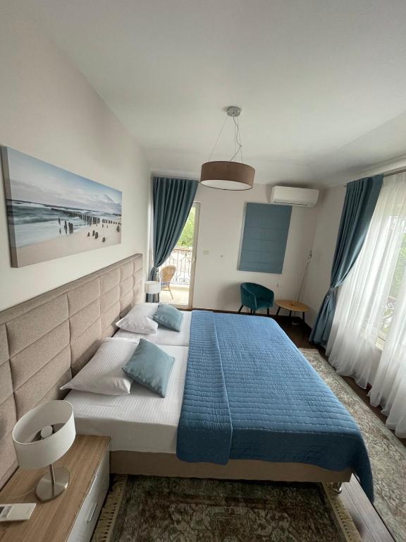 Postel nebo postele na pokoji v ubytování Luxury Villa Crystal Blue