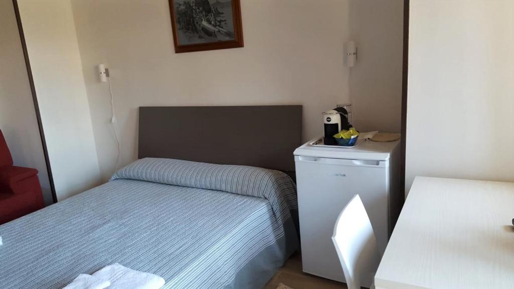 A bed or beds in a room at casa vacanze mm rooms