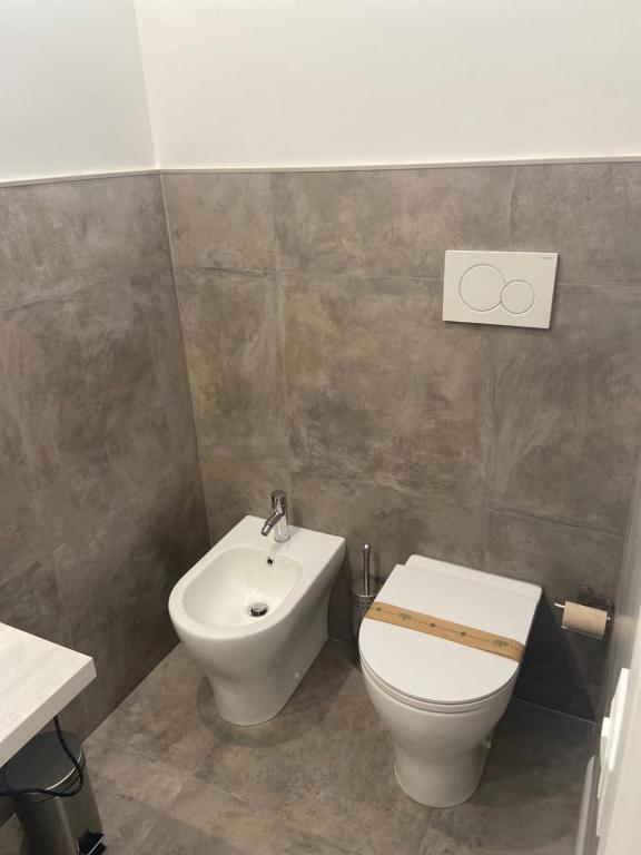 Koupelna v ubytování Minioto Rooms